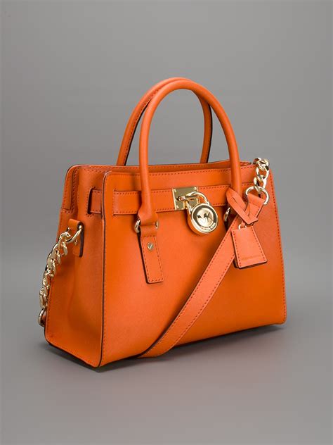 orange michael kors|Michael Kors orange bag.